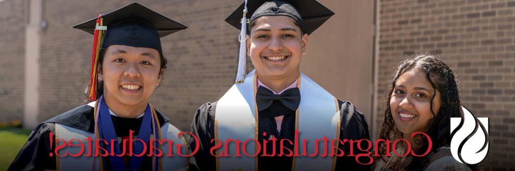 3 smiling union college graduates facing the camera.